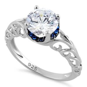 Sterling Silver Swirl Design Clear and Blue CZ Rin